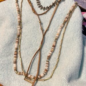 Versatile long and short necklace with metal, beads, & suede. Lots of options!
